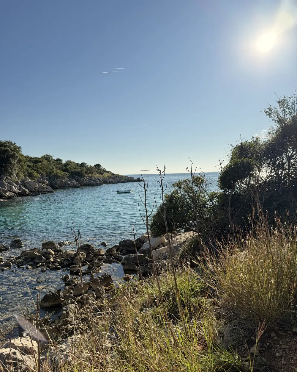 A small rocky cove at the end of the path